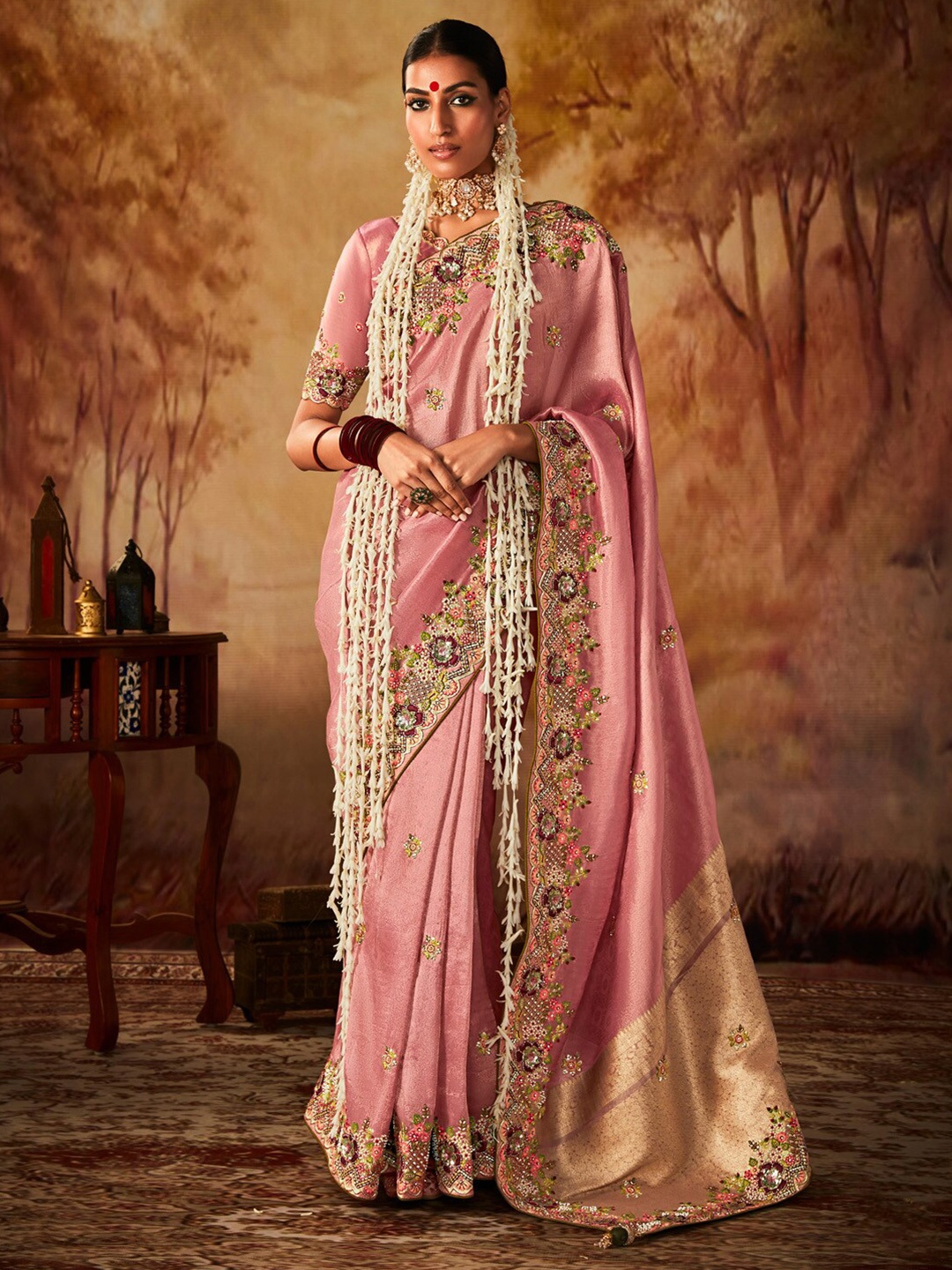 

Mitera Pink & Gold Toned Ethnic Motifs Embroidered Beads and Stones Saree