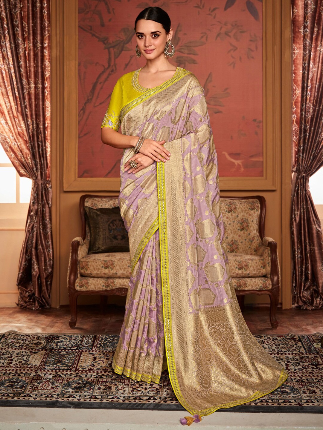 

Mitera Gold Toned & Lavender Ethnic Motifs Woven Design Sequinned Saree