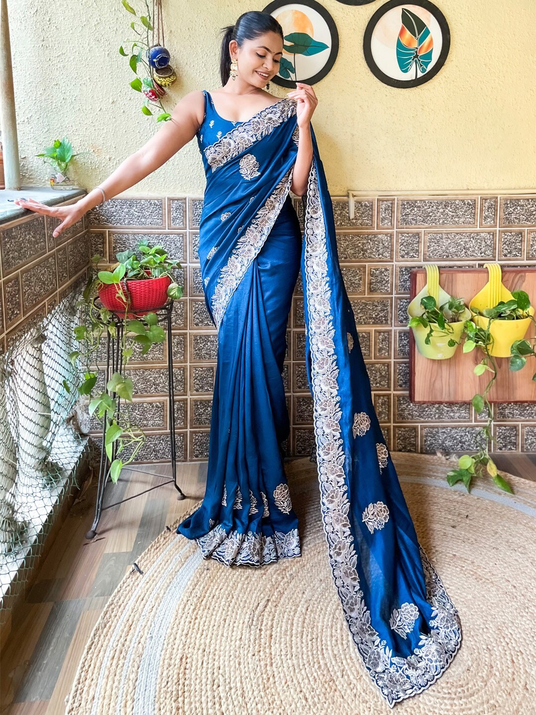 

Mitera Teal Blue Paisley Embroidered Saree