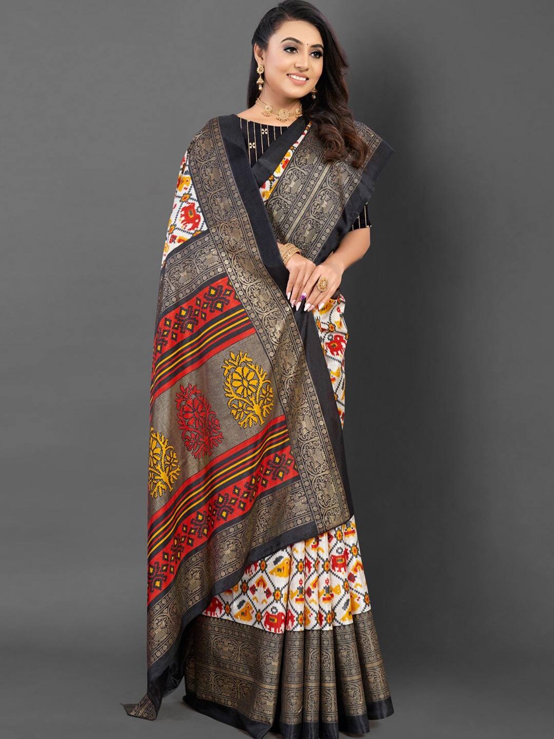 

Mitera White & Gold Toned Ethnic Motifs Printed Pochampally Saree