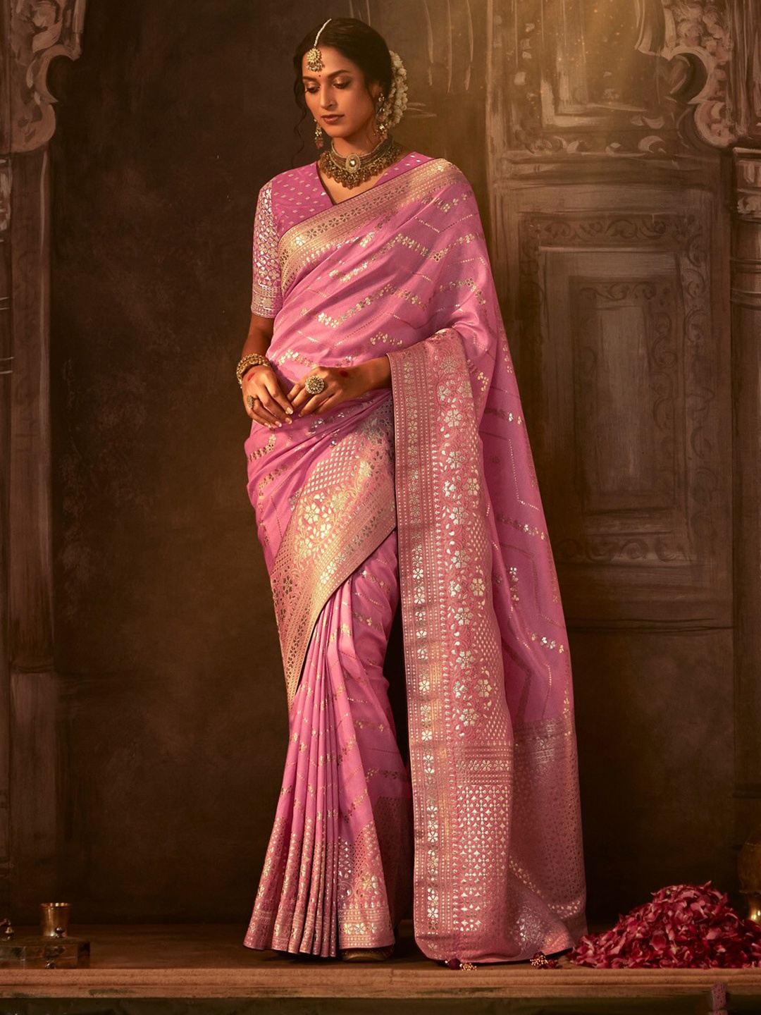 

Mitera Pink & Gold Toned Ethnic Motifs Woven Design Zari Banarasi Saree