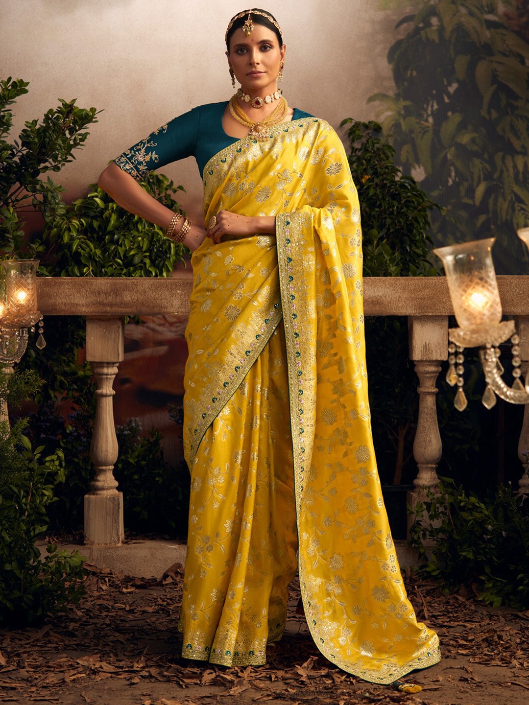 

Mitera Yellow And Gold-Toned Ethnic Motifs Woven Design Sequinned Saree