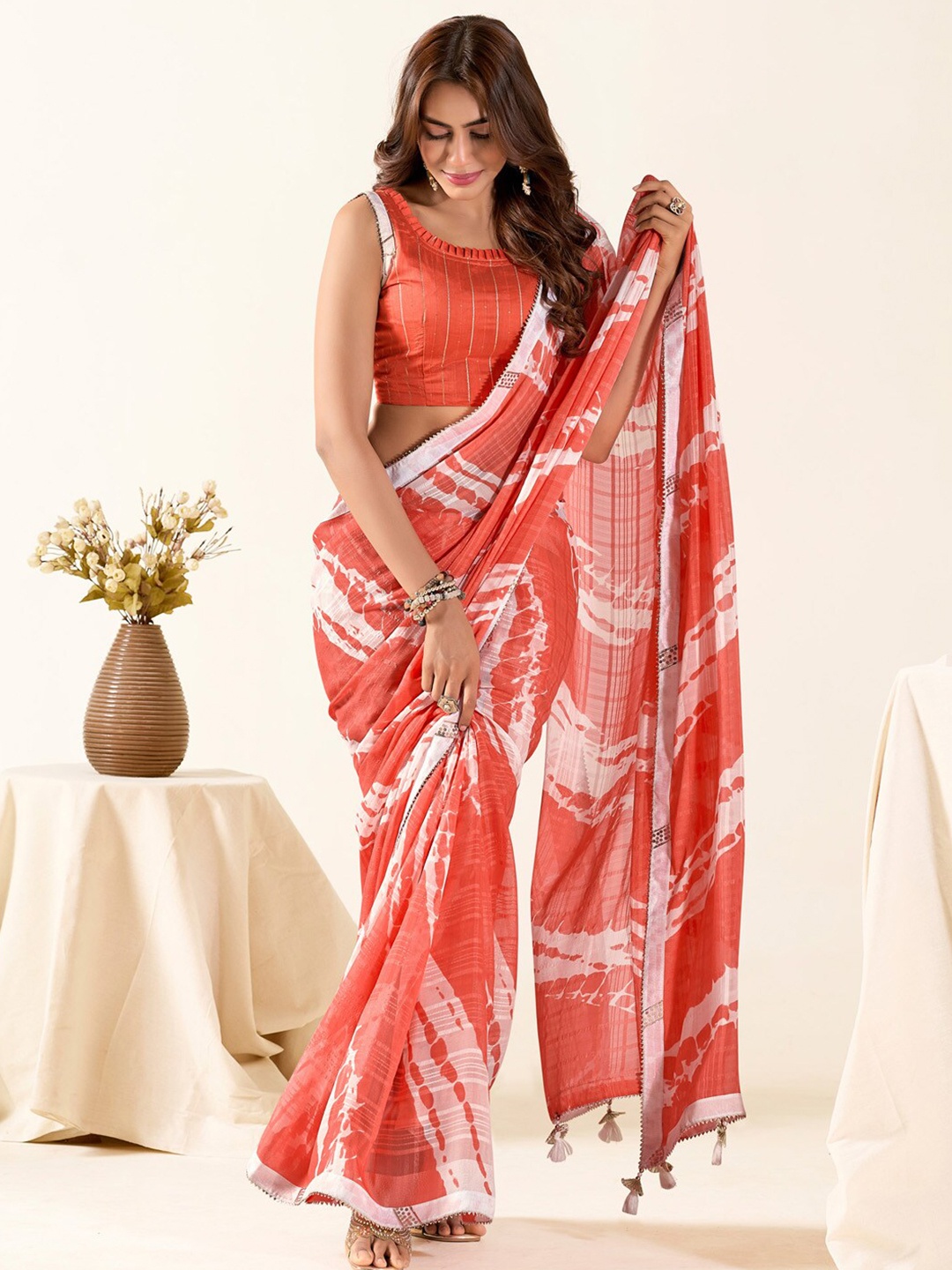 

Saree mall Sequinned Poly Georgette Saree with Tassels, Peach