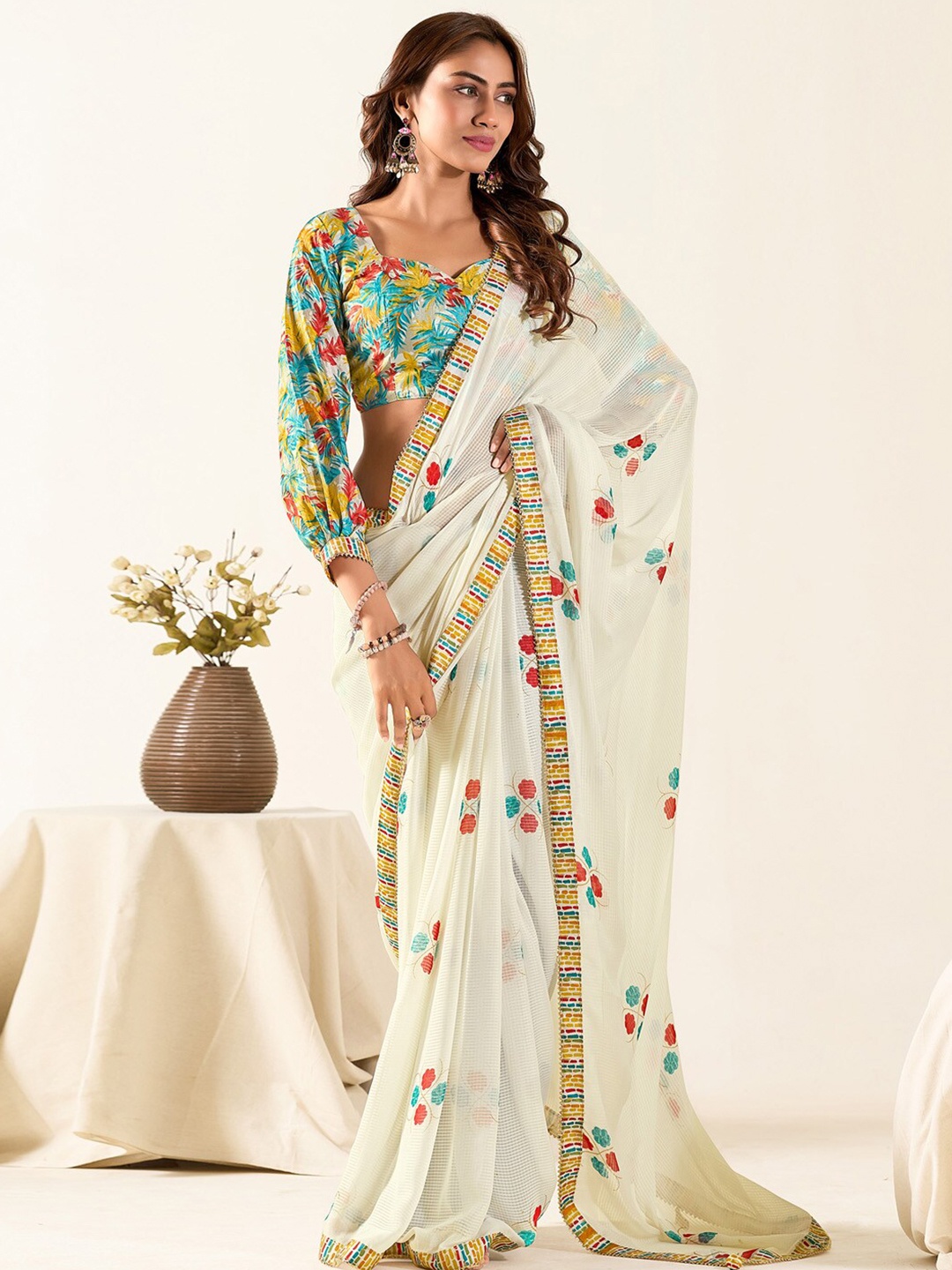 

Saree mall Ethnic Motifs Pure Georgette Saree, Cream