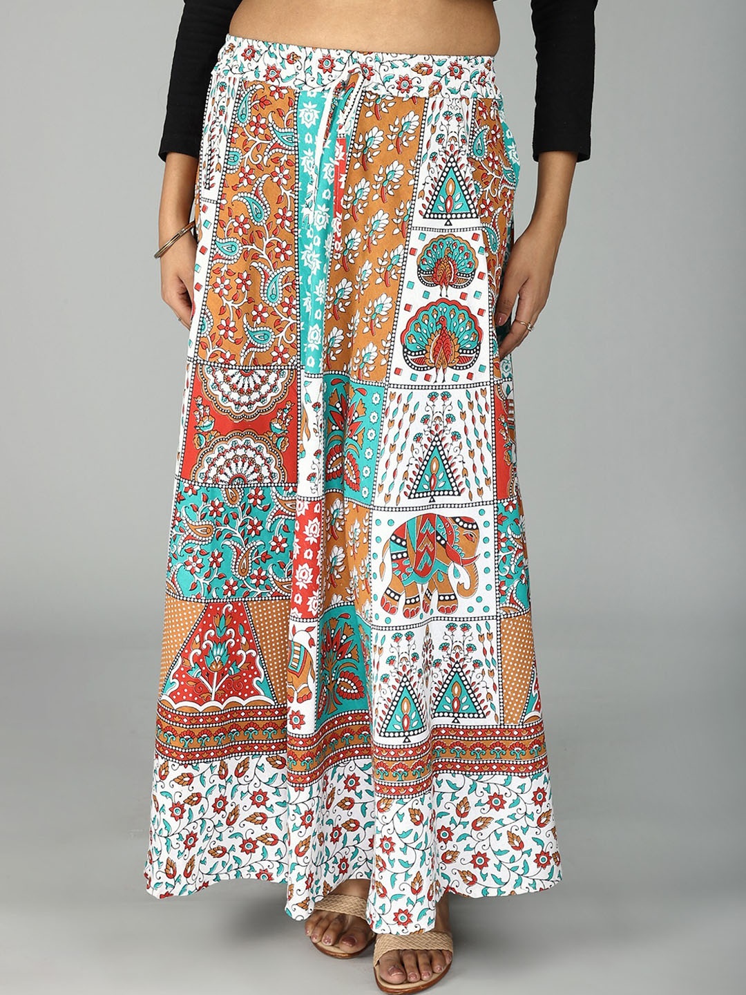 

Exotic India Pure Cotton Sanganeri Long Skirt with All Over Floral-Elephant Printed Motifs, White