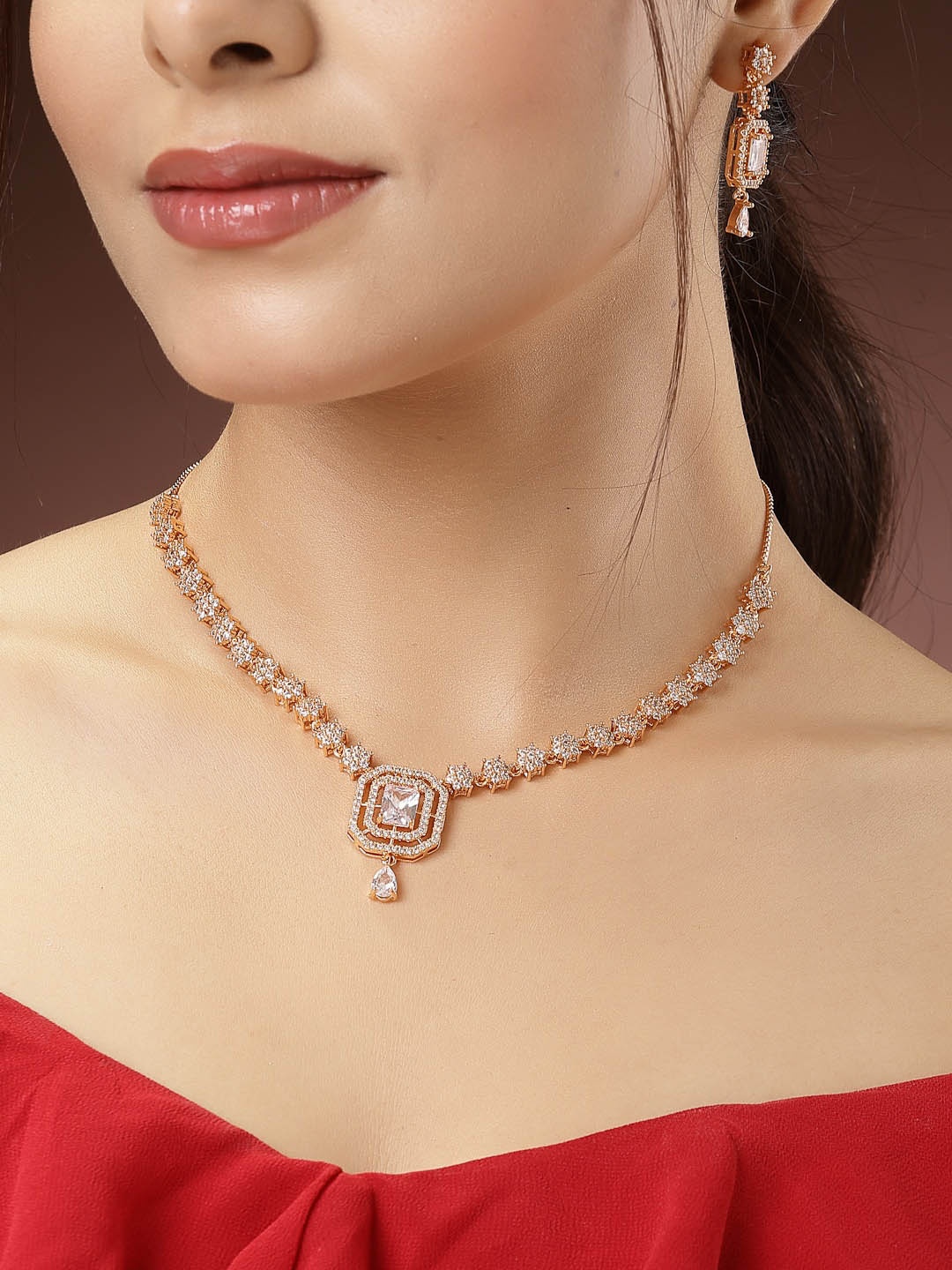 

NVR Gold-Plated American Diamond Studded Jewellery Set