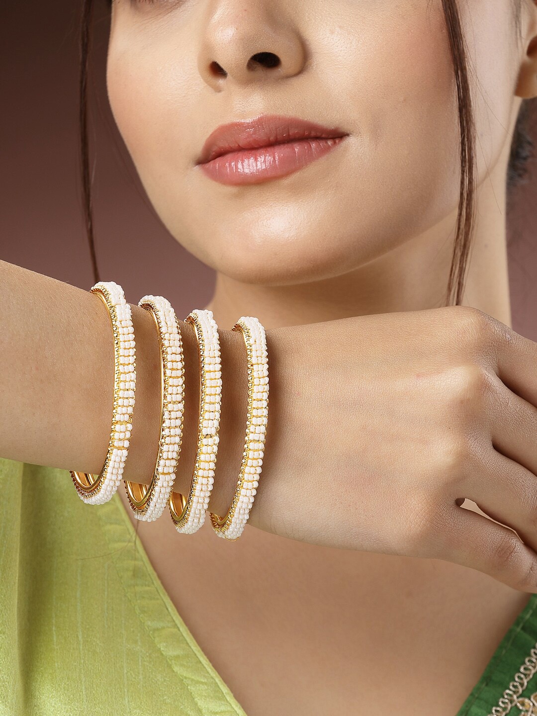 

NVR Set of 4 Gold-Plated Beaded Bangles