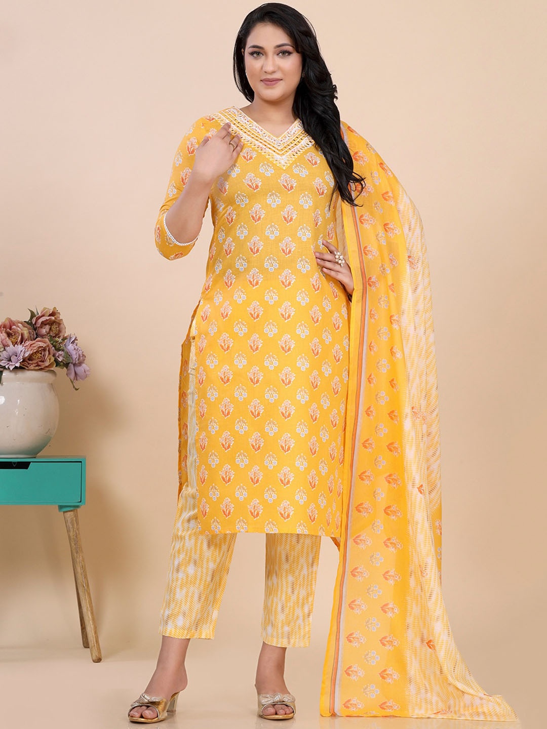 

Amchoor Floral Printed V-Neck Mirror Work Kurti with Trousers & Dupatta, Yellow