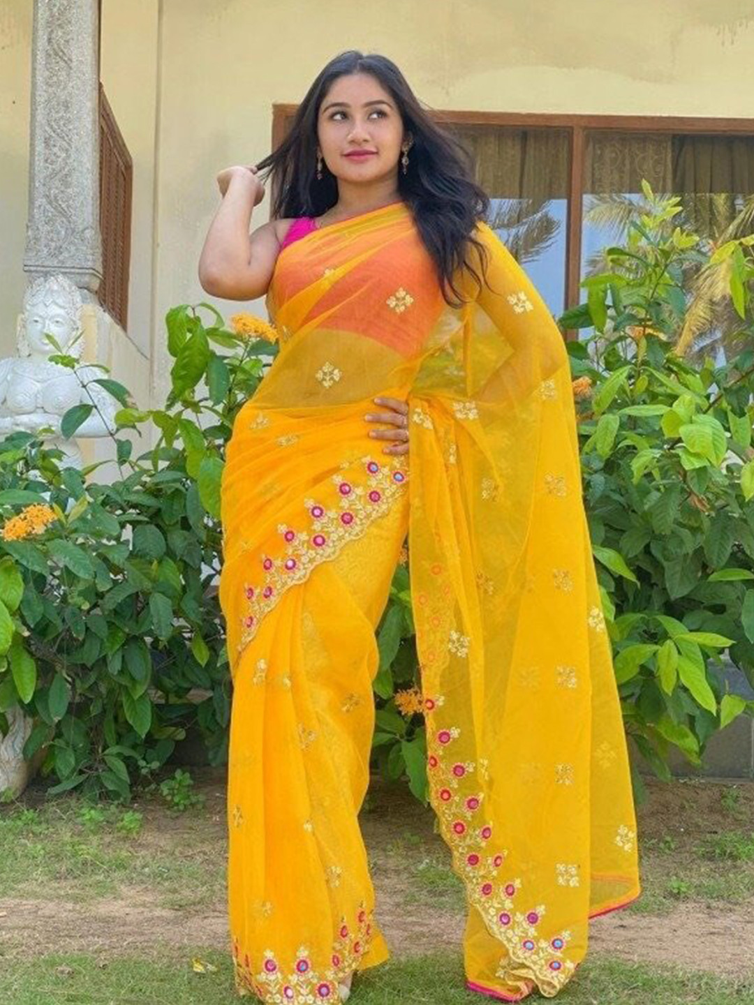 

Celeb Styles Floral Embroidered Border Net Saree, Yellow