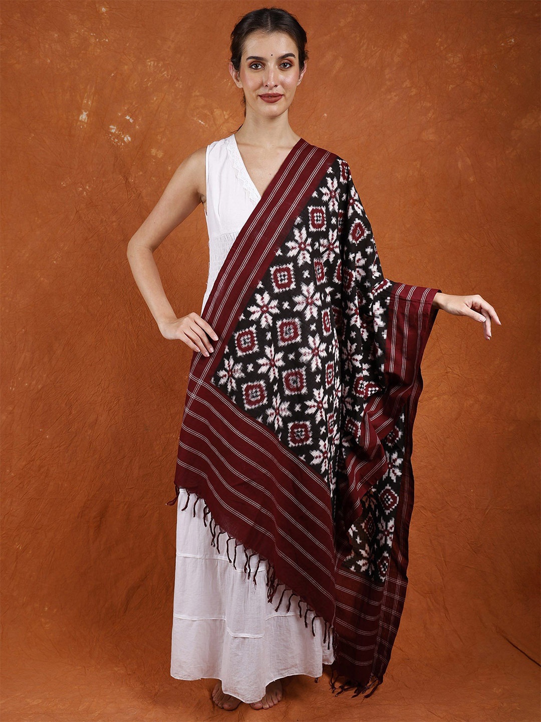 

Exotic India Forest River Pure Cotton Pochampally Handloom Dupatta with Double Ikat Weave, Maroon