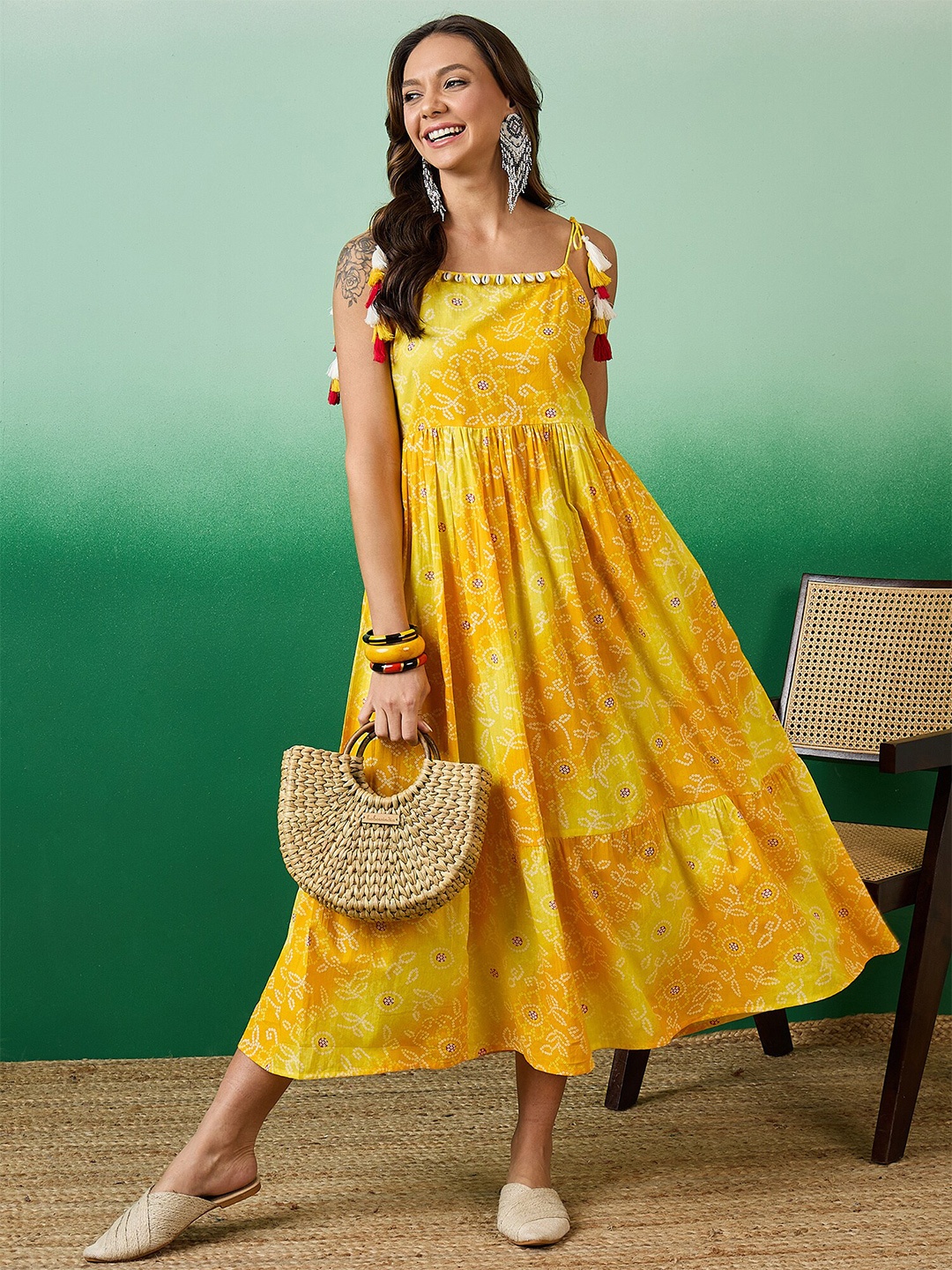 

Sangria Yellow Bandhani Printed Pure Cotton Sleeveless A-Line Midi Ethnic Dress