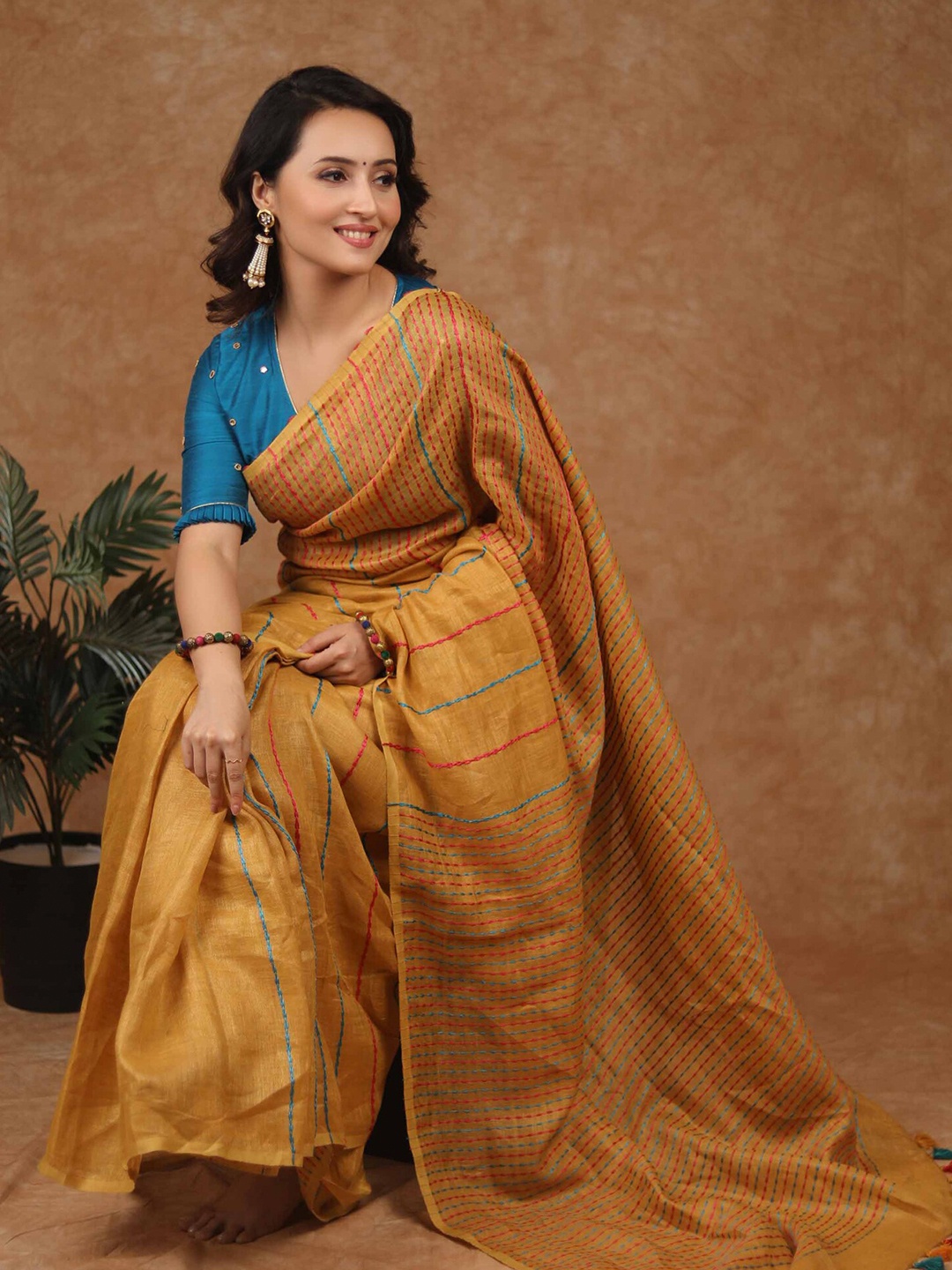 

Prasam Striped Embroidered Pure Linen Saree, Yellow