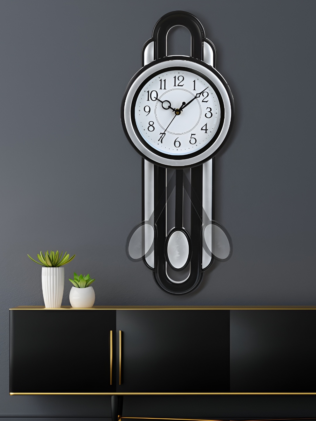 

Attractionz Silver-Toned Round Shaped Contemporary Pendulum Wall Clock