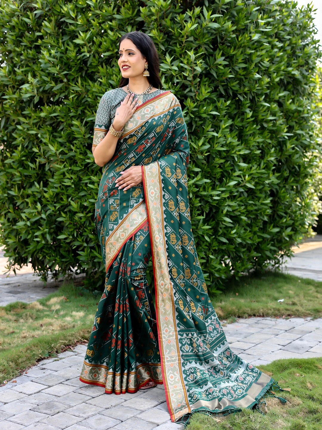

SHIVAARYA Woven Design Zari Silk Blend Patola Saree, Green