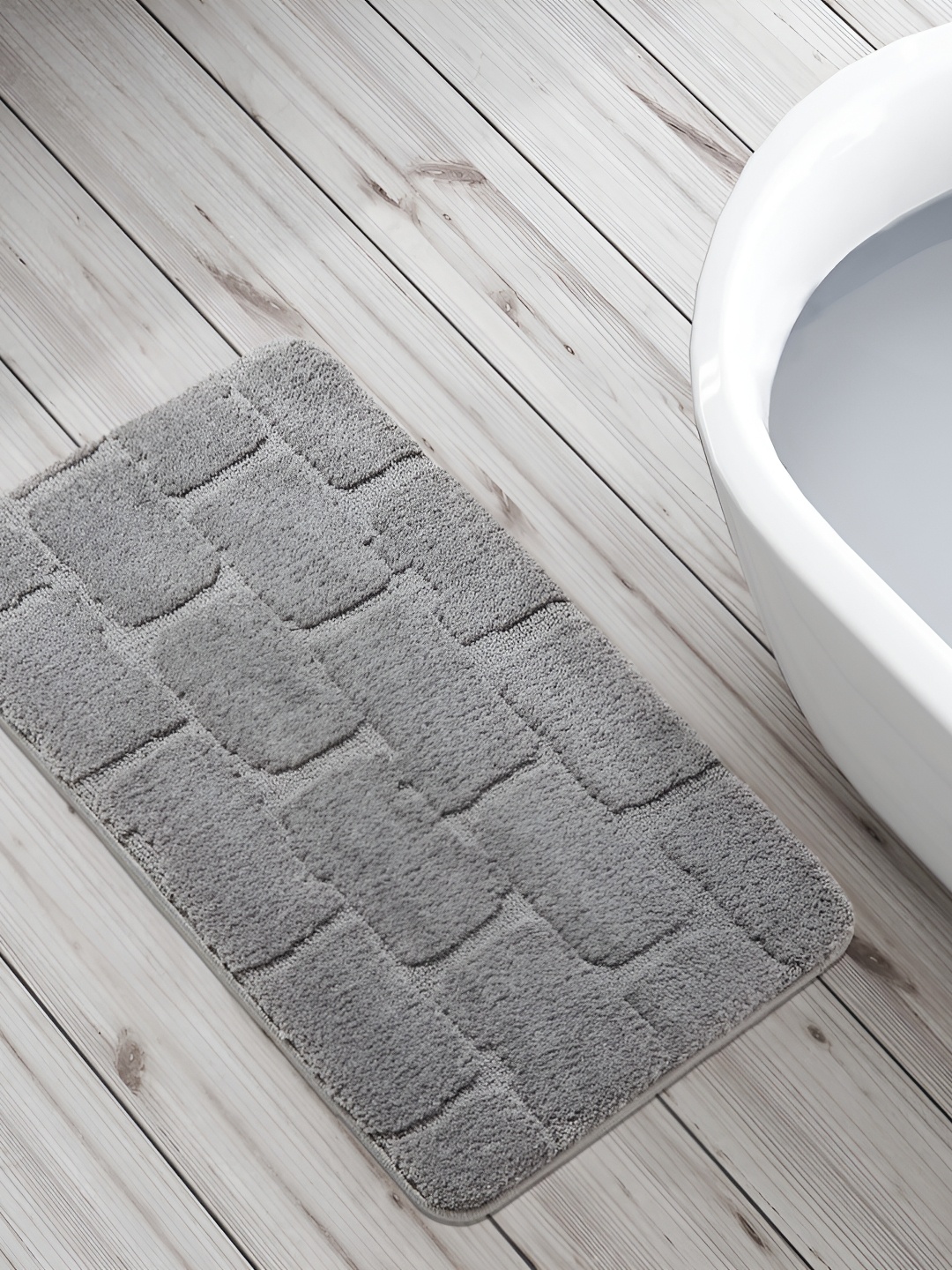 

Home Centre Grey Dots Textured 240 GSM Bath Rug