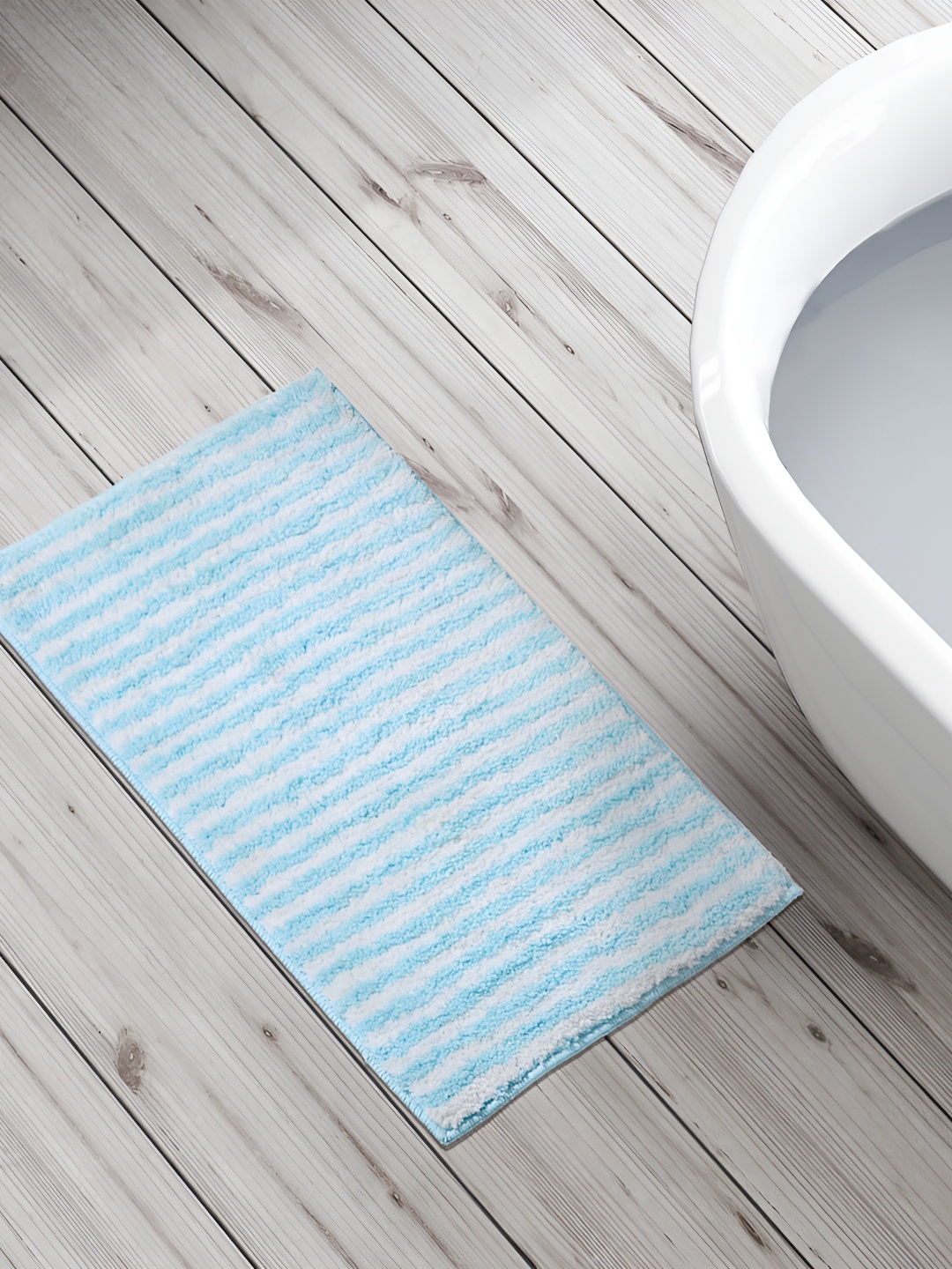 

Home Centre Blue & White Striped 240 GSM Bath Rug