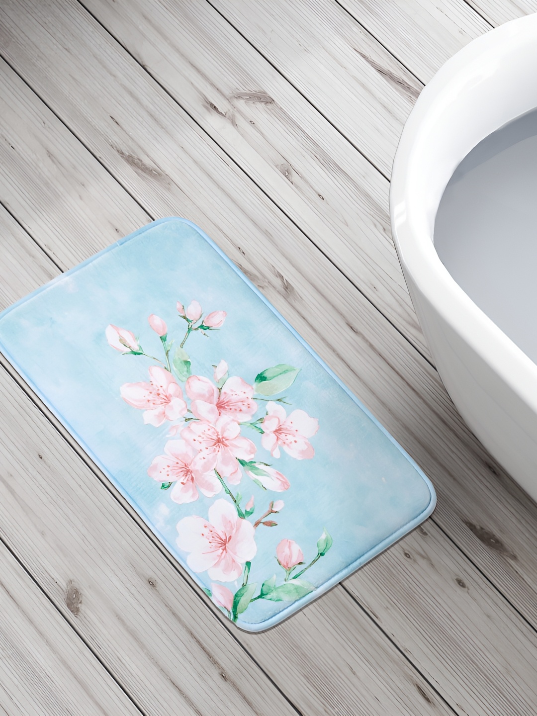 

Home Centre Blue & Pink Printed 240 GSM Anti-Skid Bath Rug