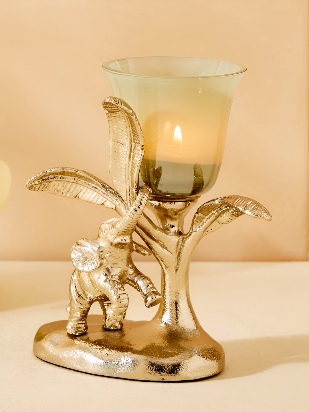 

Home Centre Eternity Vivere Gold-Toned & White Textured Glass Elephant Votive Holder