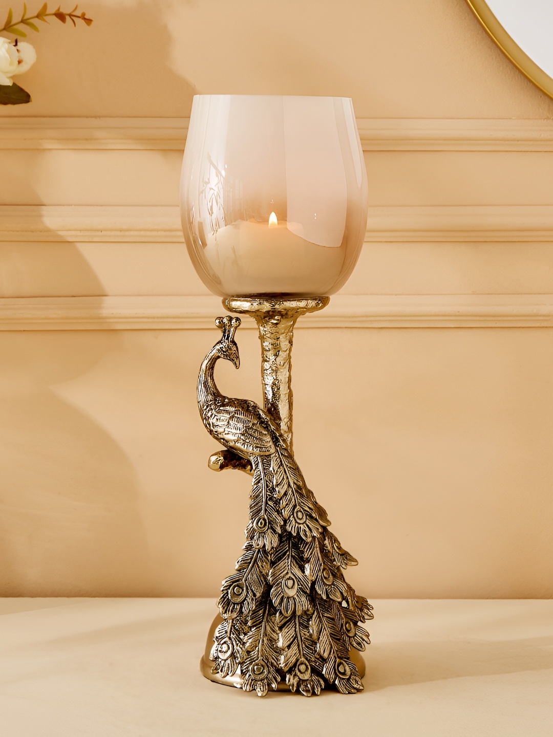 

Home Centre Eternity Vivere Gold-Toned Textured Glass Peacock Candle Holder