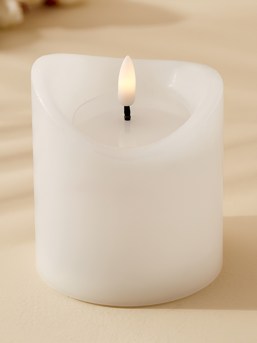

Home Centre White Pegasus Matte LED Pillar Candle