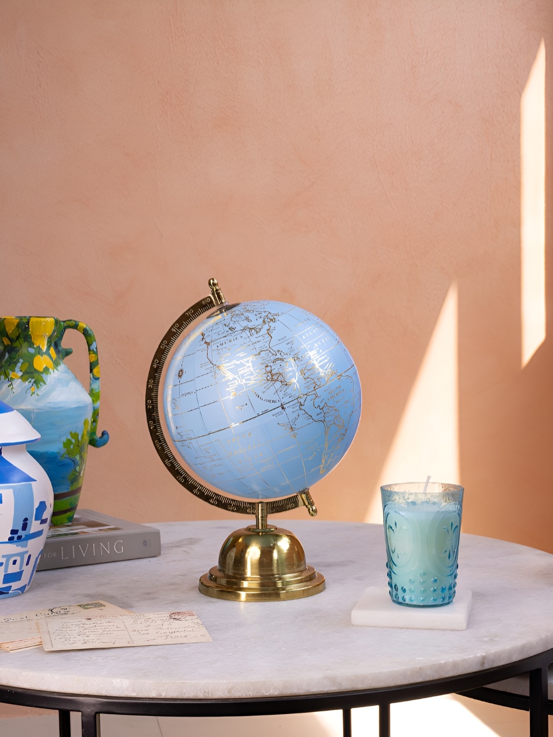 

Artstory Ventures Gold-Toned Blue Globe Decorative Showpiece