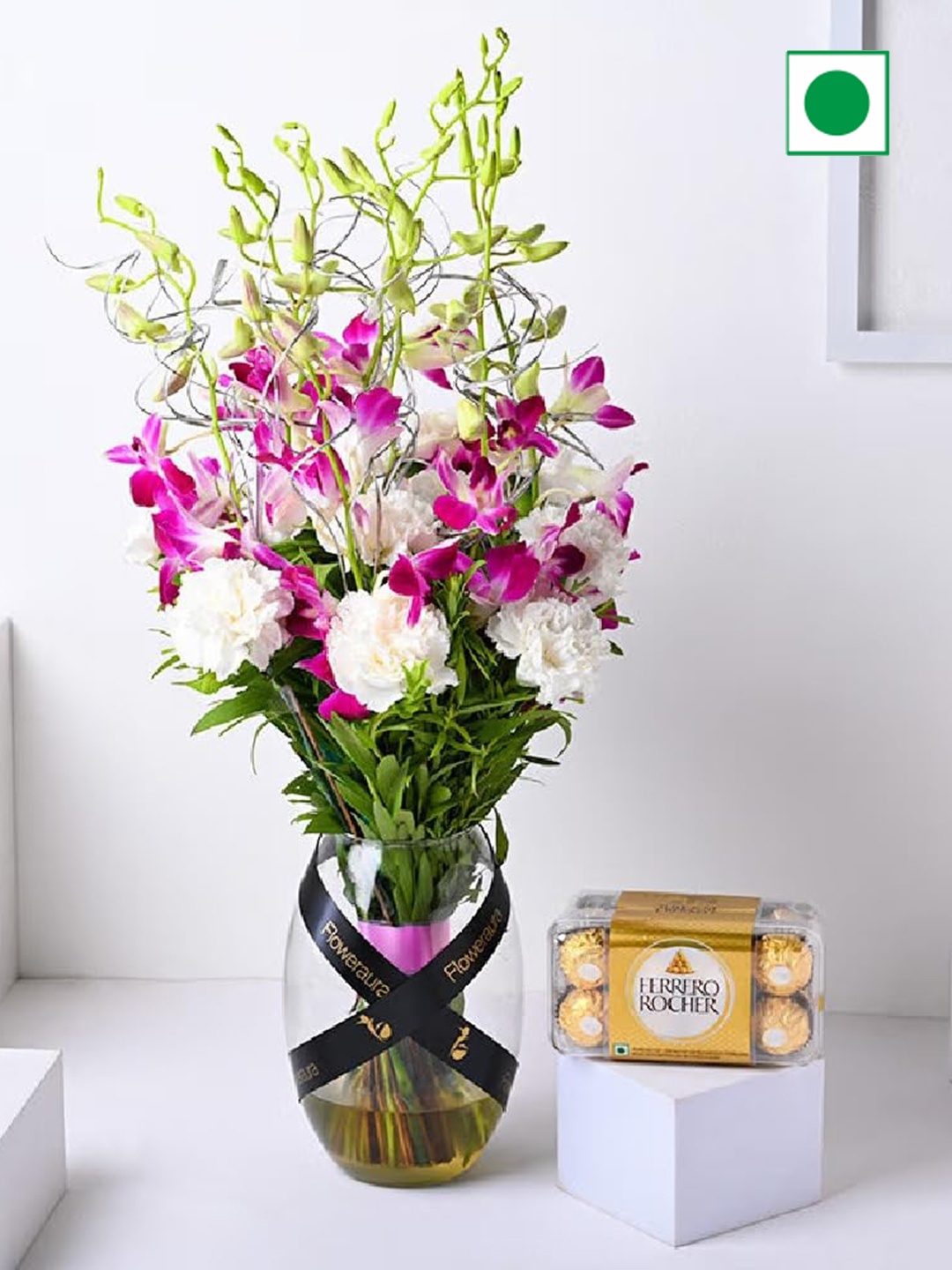 

Floweraura Set of 2 Carnations In Vase With Chocolate Pack, Peach