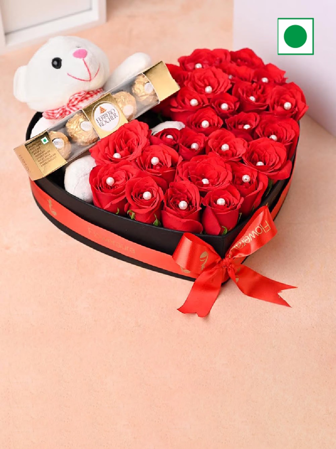 

Floweraura Fresh Live 25 Red Roses With 5 Chocolate & Cute Teddy Bear In Heart Shape Box