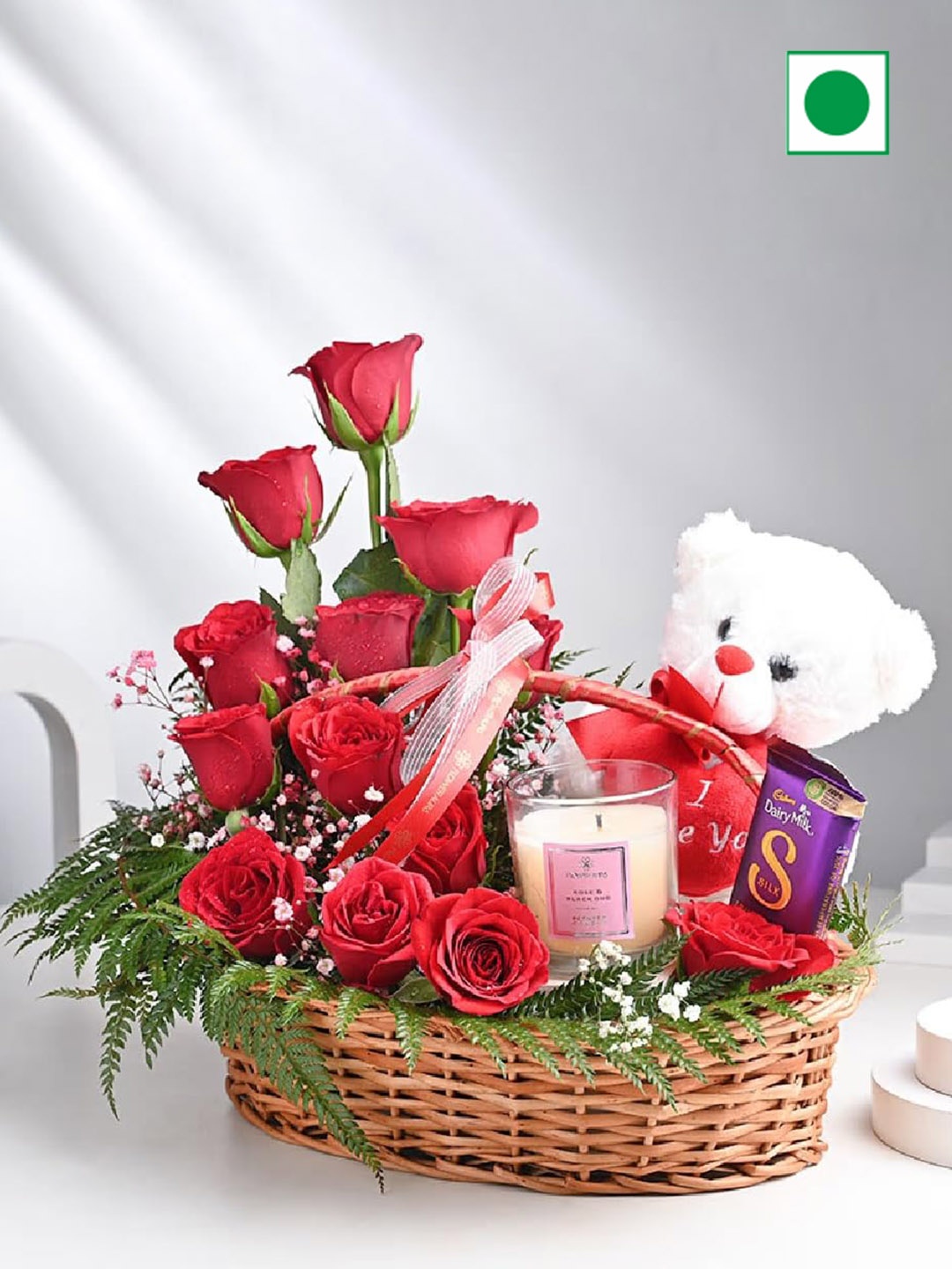 

Floweraura 12 Red Roses Flower With Chocolate & Candle In Basket