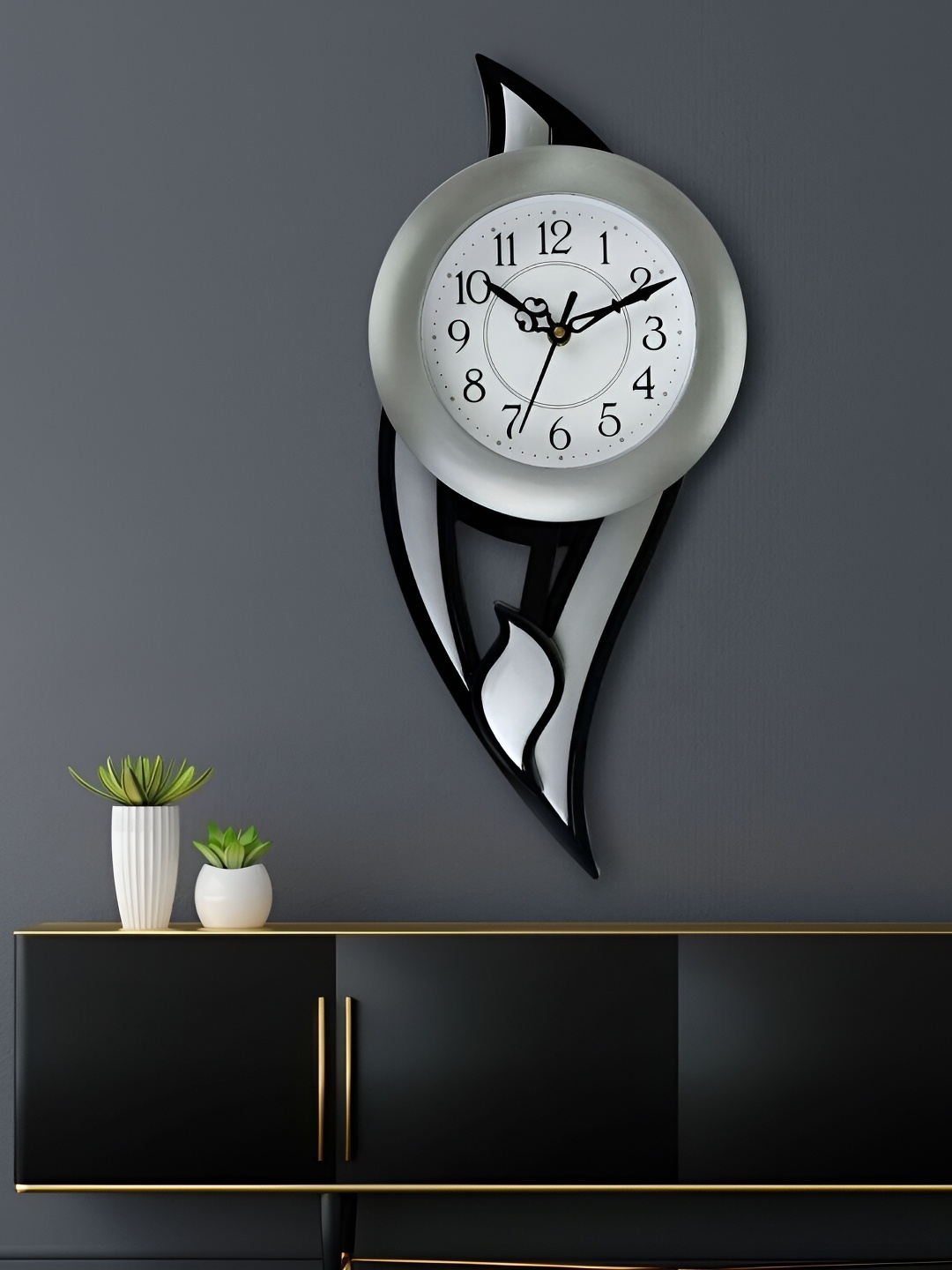 

Attractionz Silver-Toned & Black Wall Clock