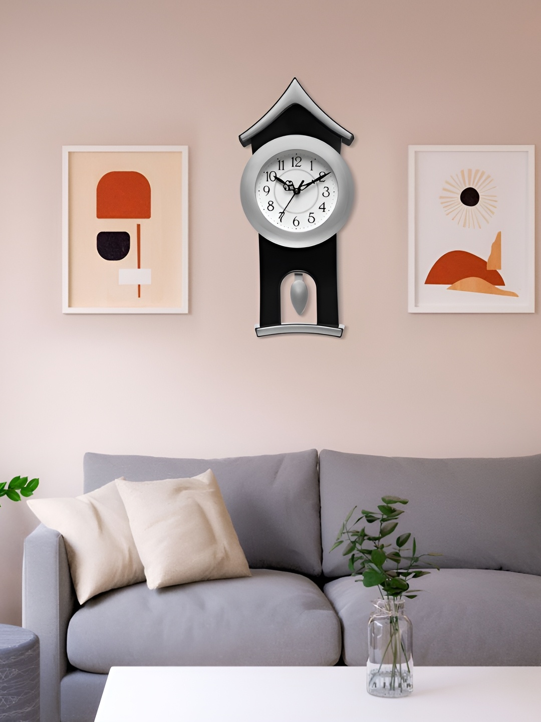 

Attractionz Quirky Silver-Toned Wall Clock