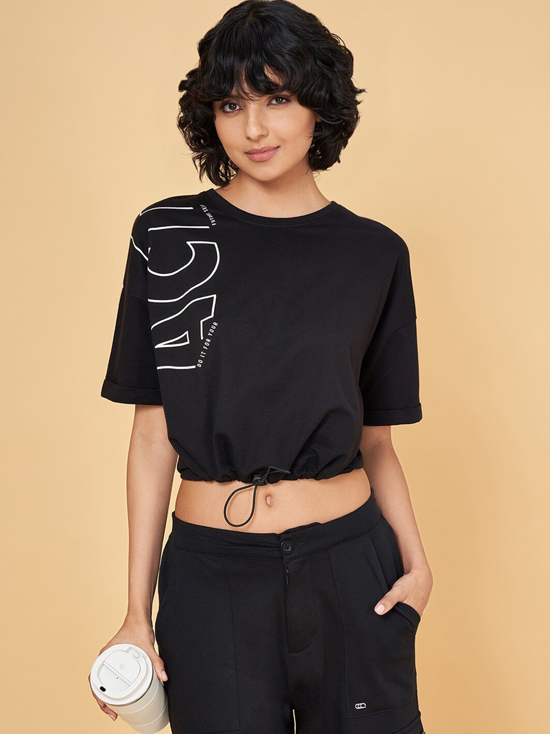 

Ajile by Pantaloons Women Typography Printed Pockets T-shirt, Black