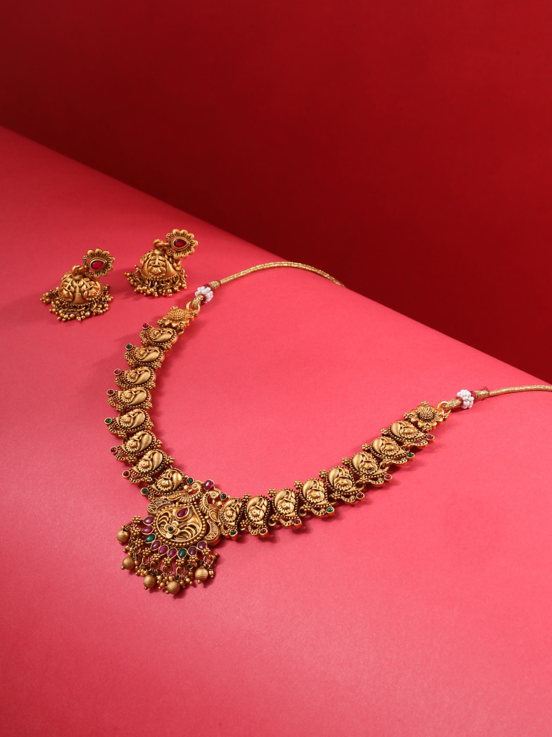 

Saraf RS Jewellery Gold Plated Kemp Studded Necklace & Earrings