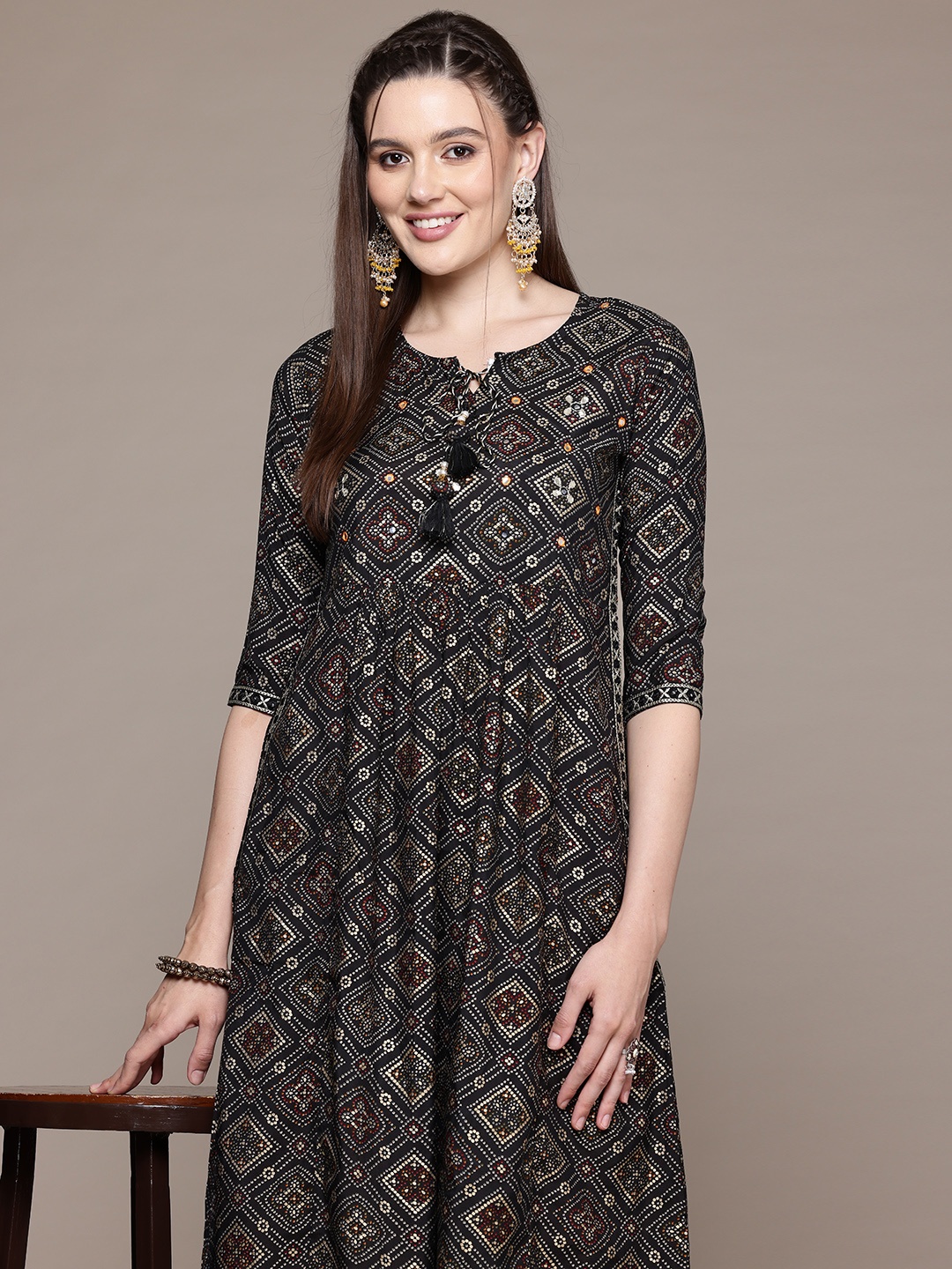 

Readiprint Fashions Bandhani Printed Pleated Mirror Work Pure Silk Kurta With Trousers, Black