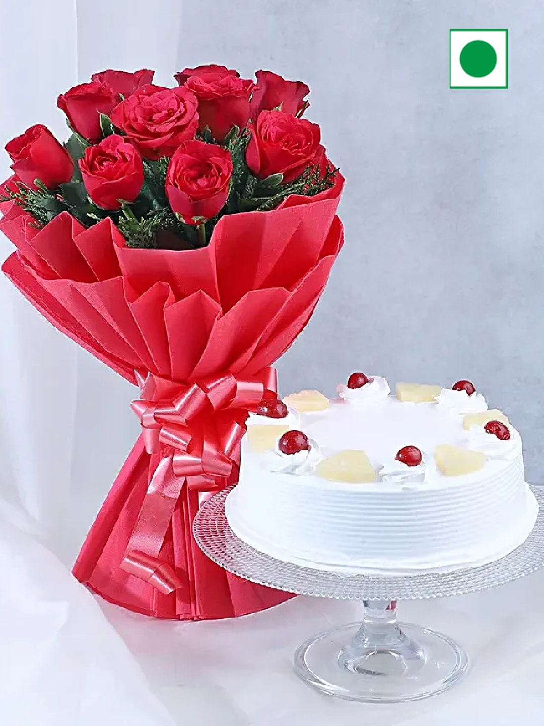 

fnp 10-Pcs Fresh Red Roses Bouquet with Pineapple Cake- 900gm