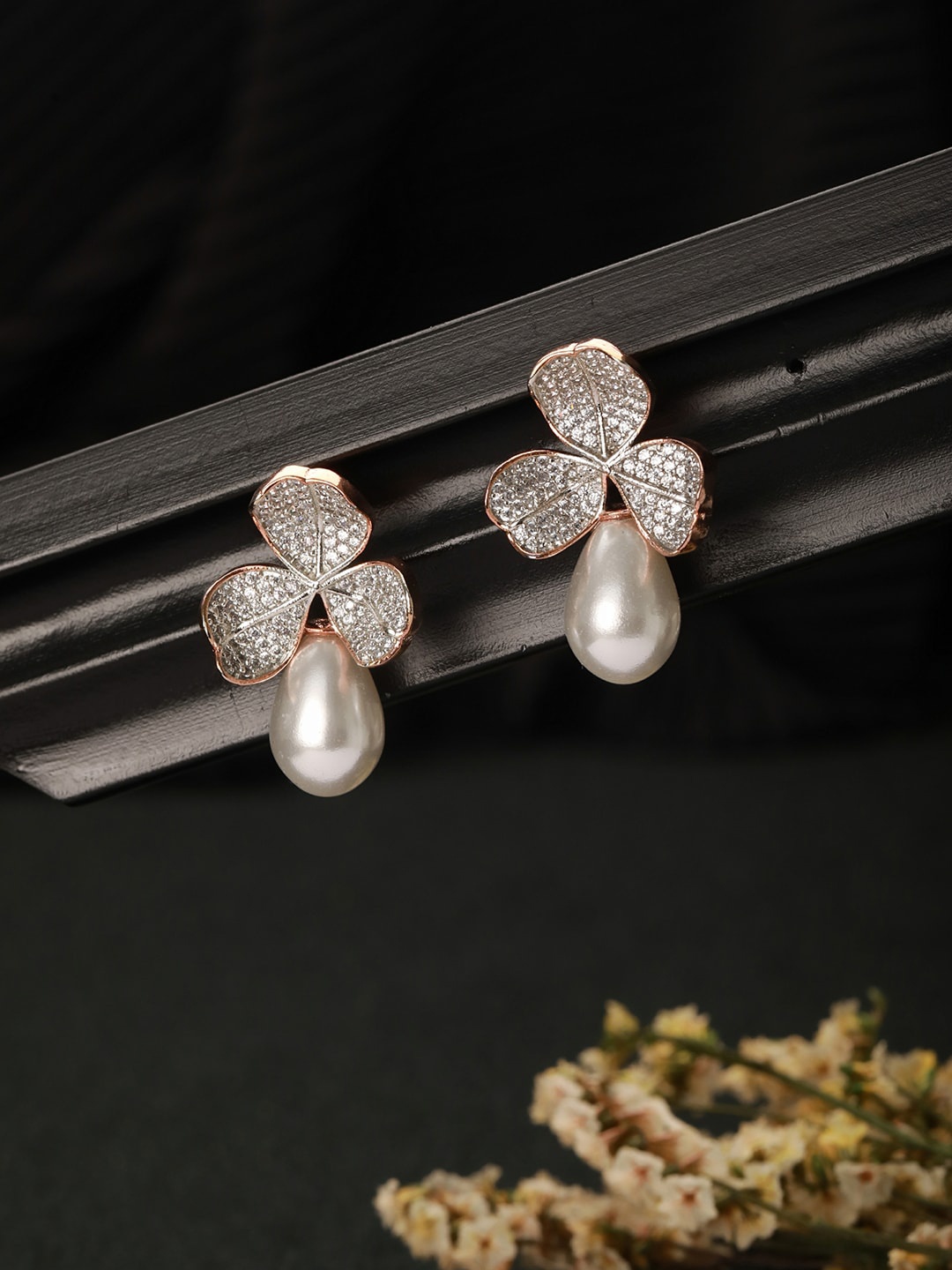 

Saraf RS Jewellery Rose Gold Plated AD Studded Pearl Studs Earrings