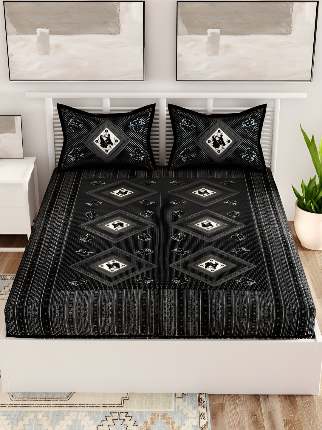 

Aura Black & White Geometric 120 TC Queen Bedsheet with 2 Pillow Covers