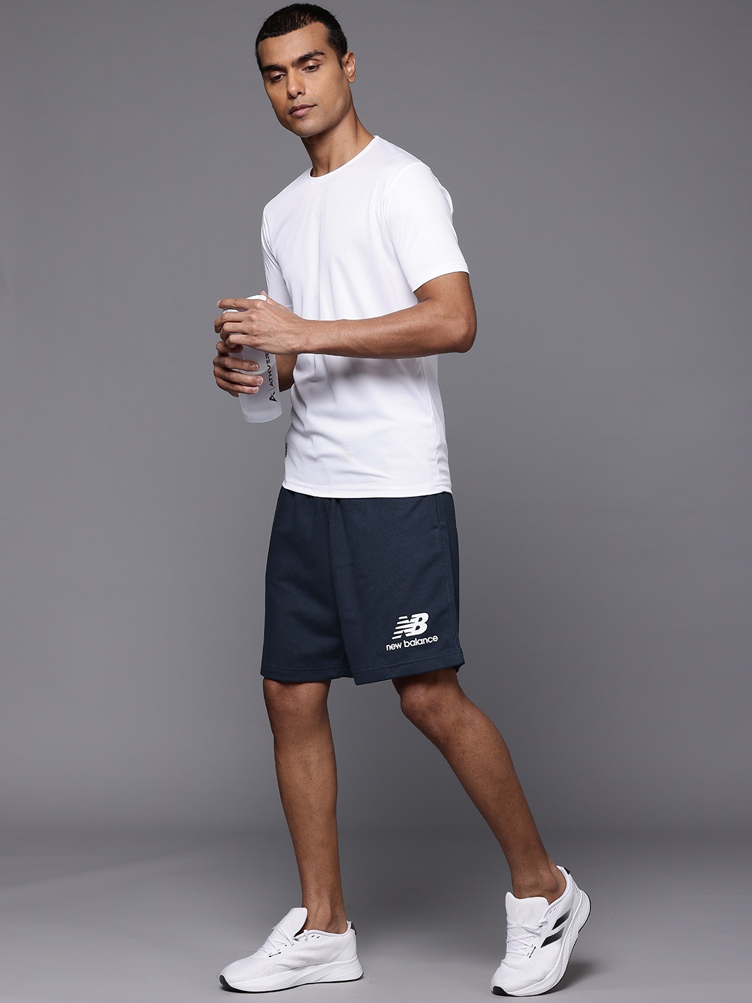 

New Balance Men Eclipse Stacked Logo Sports Shorts, Navy blue