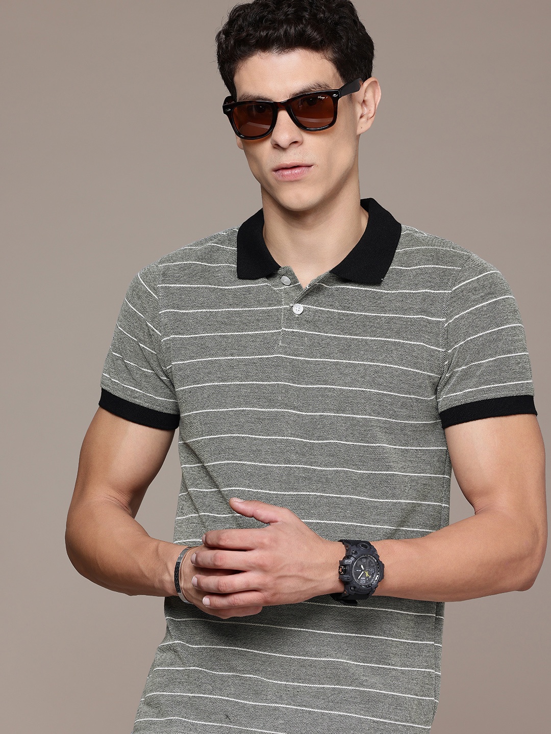 

Roadster Men Striped Polo Collar T-shirt, Black