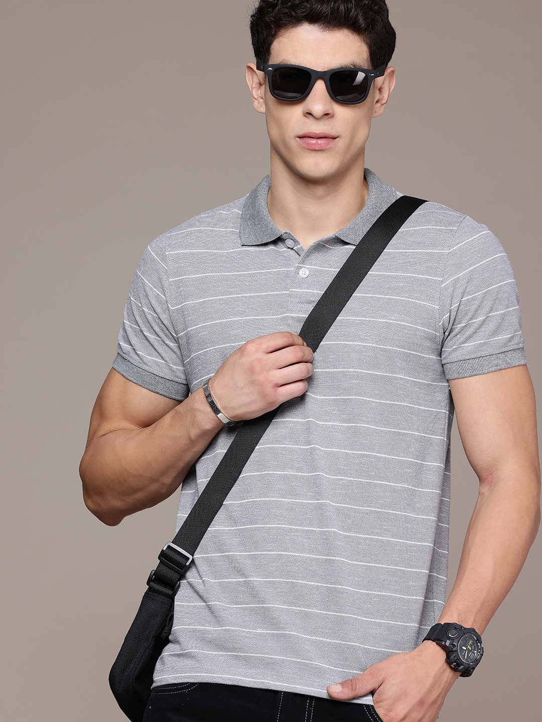 

Roadster Men Striped Polo Collar T-shirt, Grey melange