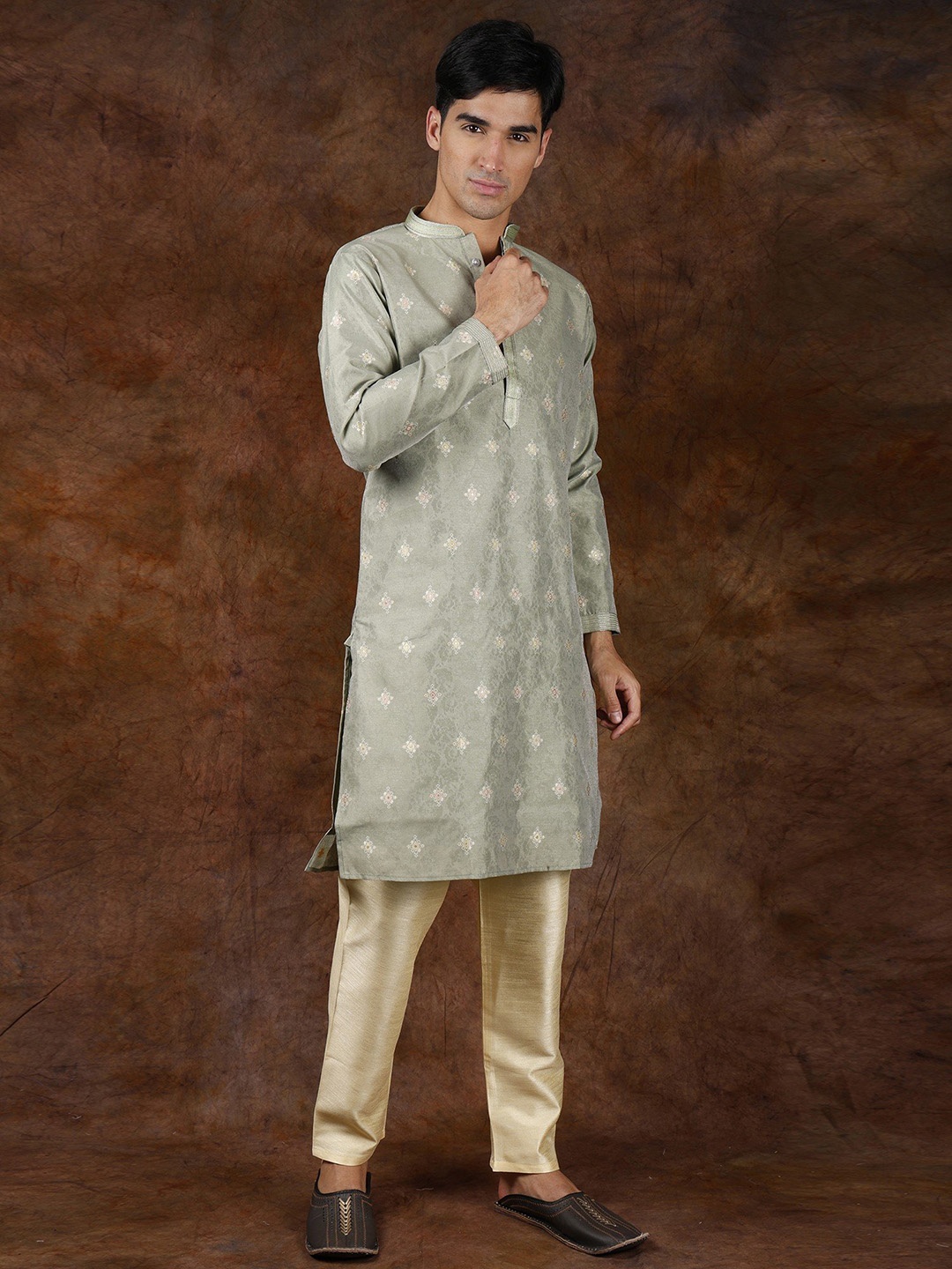 

Exotic India Laurel Green Woven Bootis Wedding Kurta Pajama Set with Gota Patti on Neck