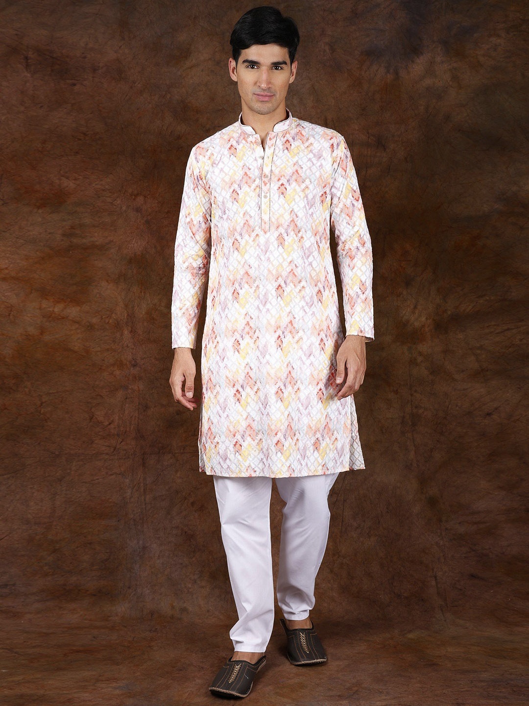 

Exotic India Rainbow Pure Cotton Kurta Pajama Set with Diamond Pattern Thread Embroidery, White