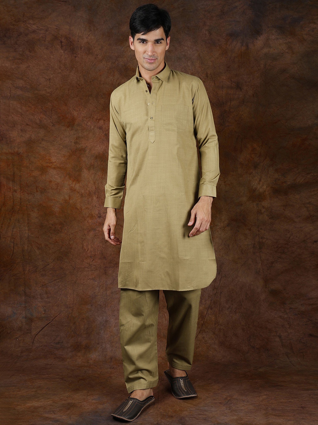

Exotic India Green Olive Plain Pure Cotton Pathani Kurta Pajama Set with Front Pocket
