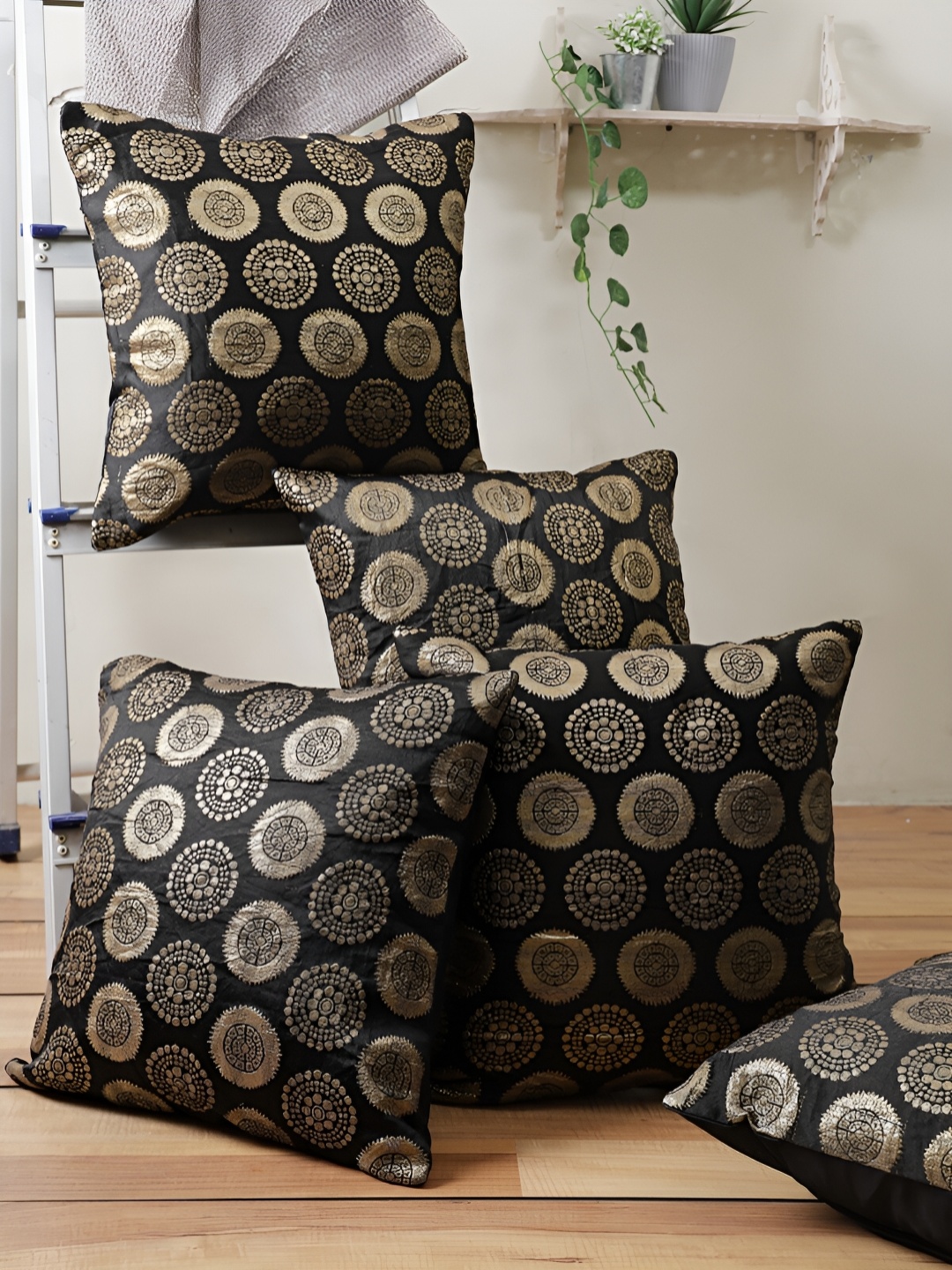 

Aura Black & Gold-Toned 5 Pieces Floral Square Cushion Covers