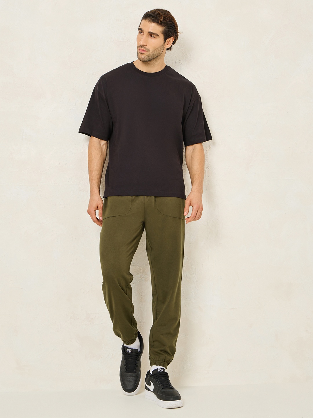 

Styli Men Oversized Terry Jogger with Panel Pocket & Elasticated Cuff, Olive