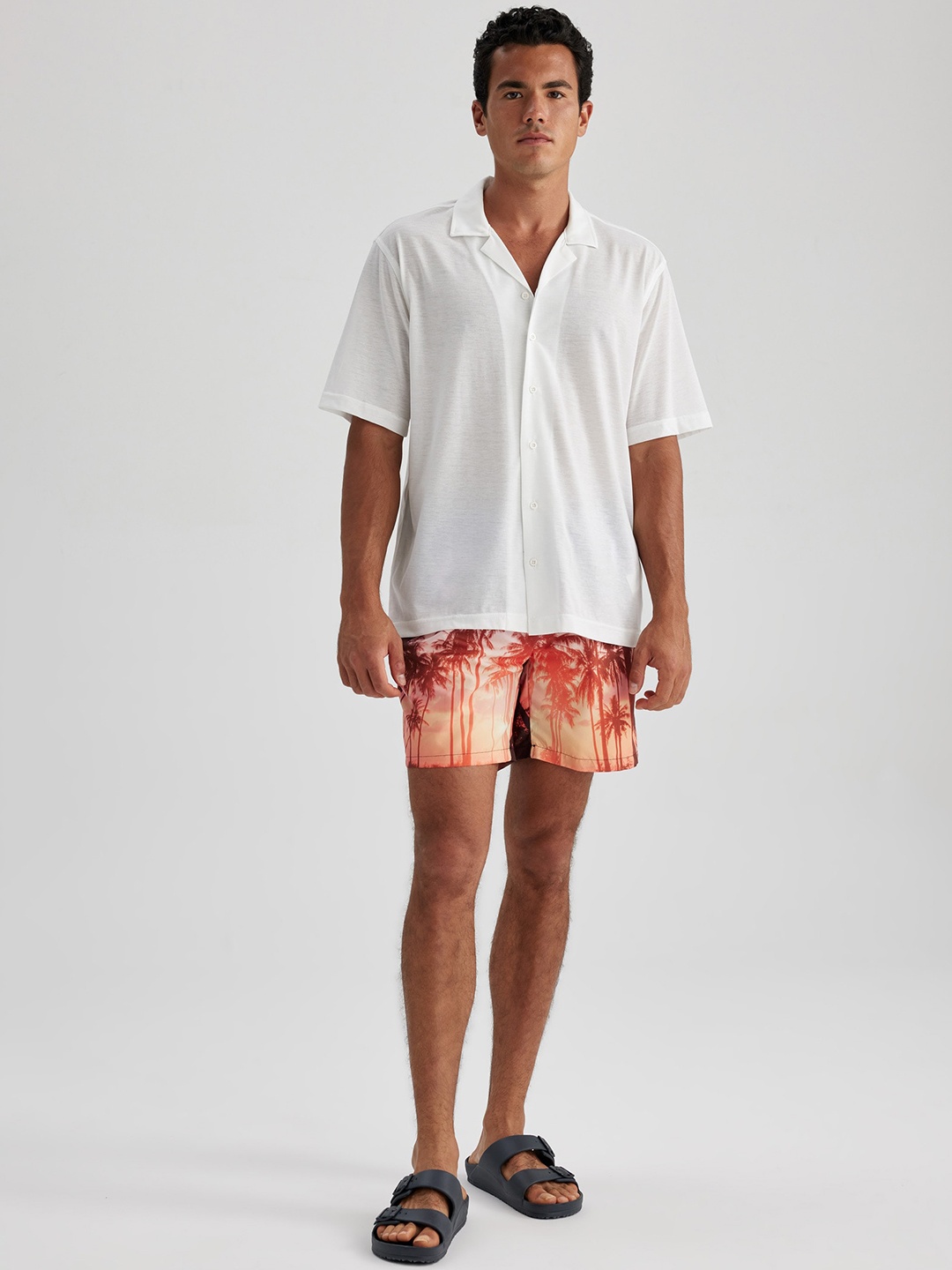 

DeFacto Men Abstract Printed Mid-Rise Shorts, Orange