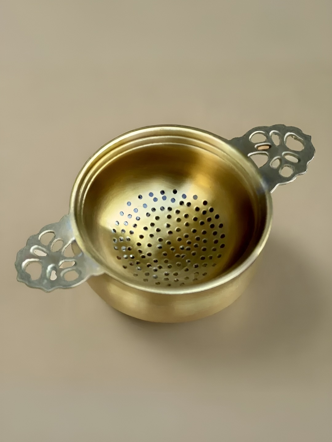 

Peepul Tree Gold Toned Brass Tea Sieve Strainer