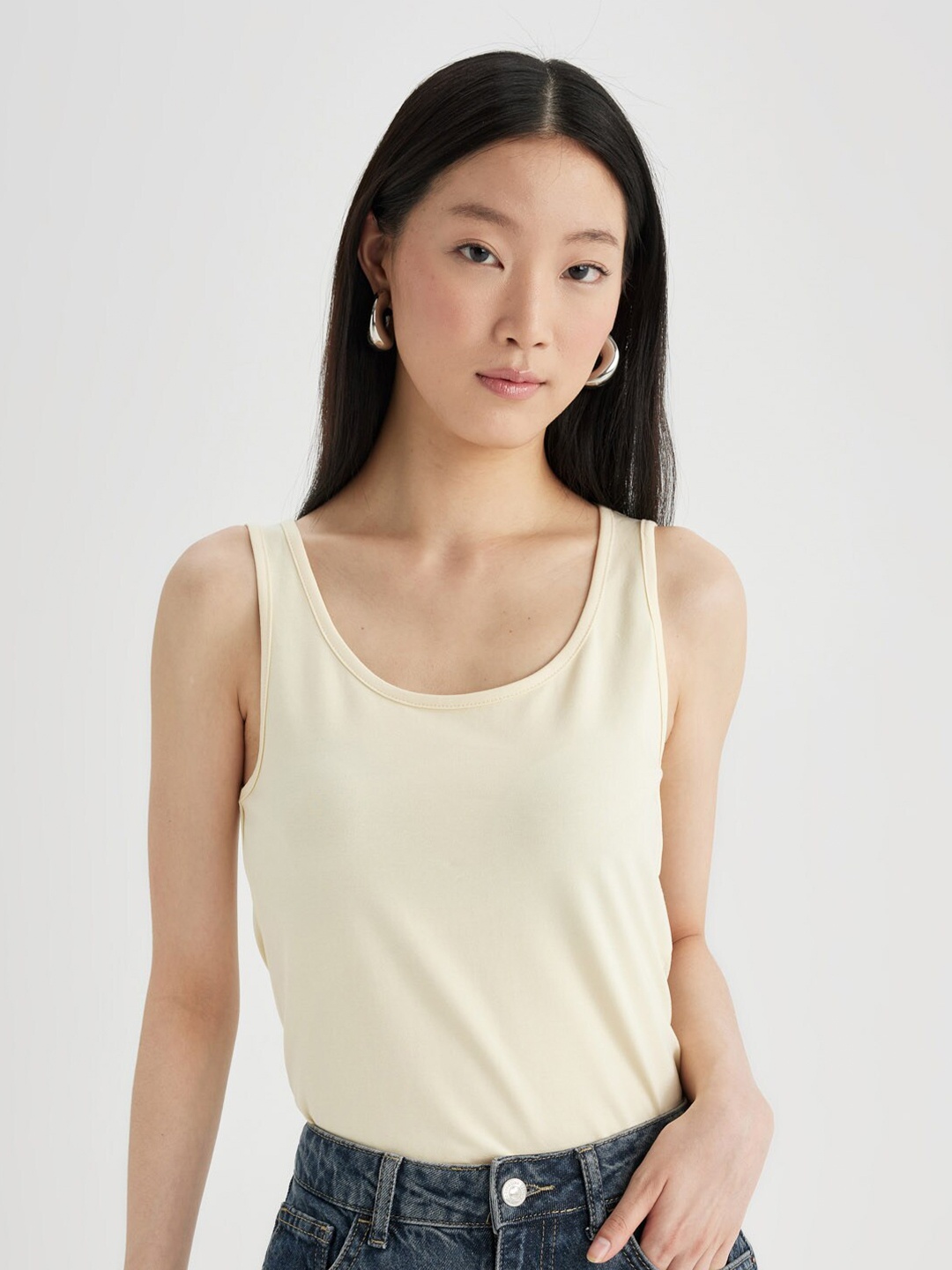 

DeFacto Women Solid Cotton Scoop Neck Sleeveless Top, Cream