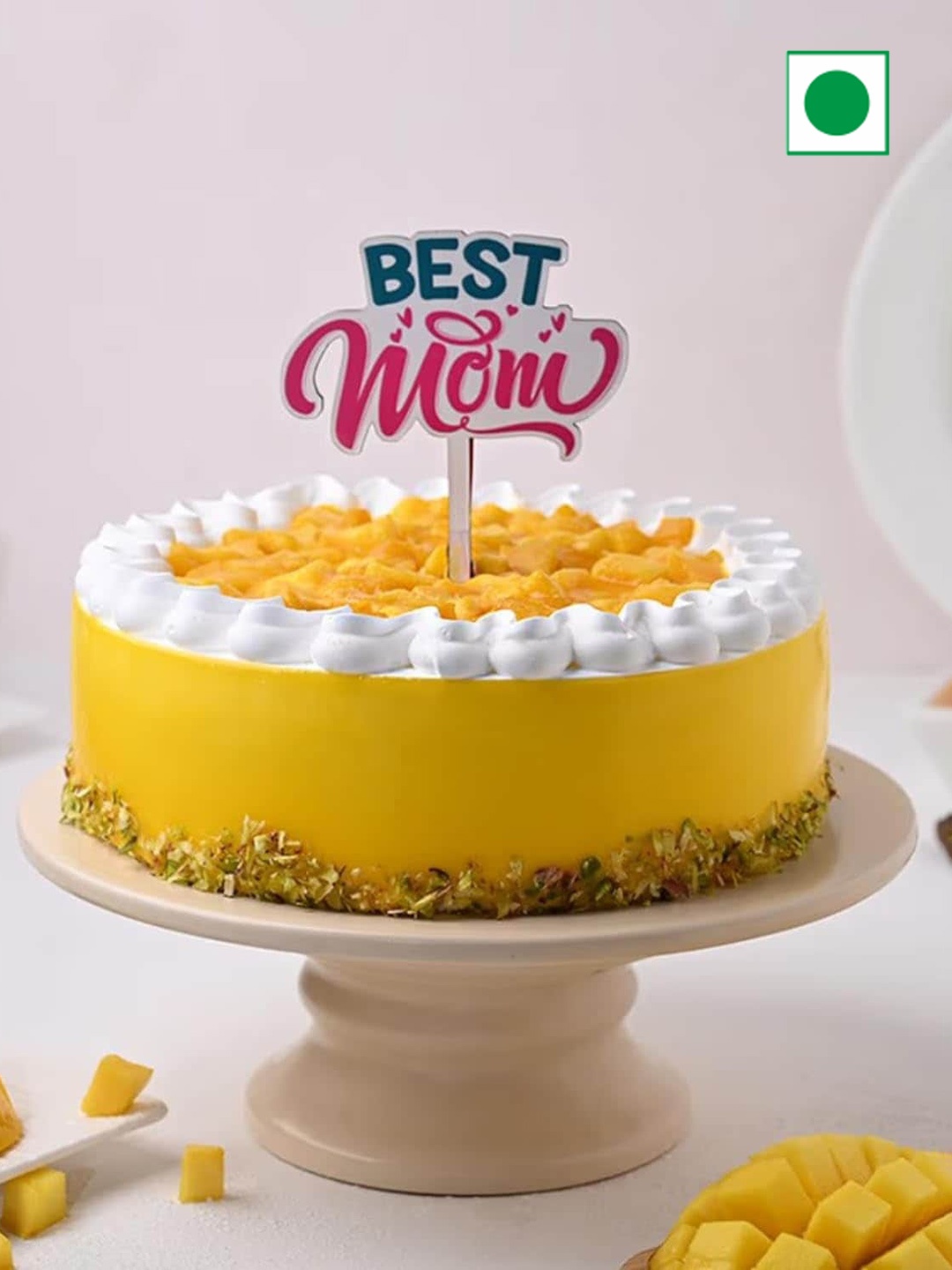 

Floweraura Mother's Day Round Eggless Mango Pistachio Flavour Cake 1 kg, Yellow
