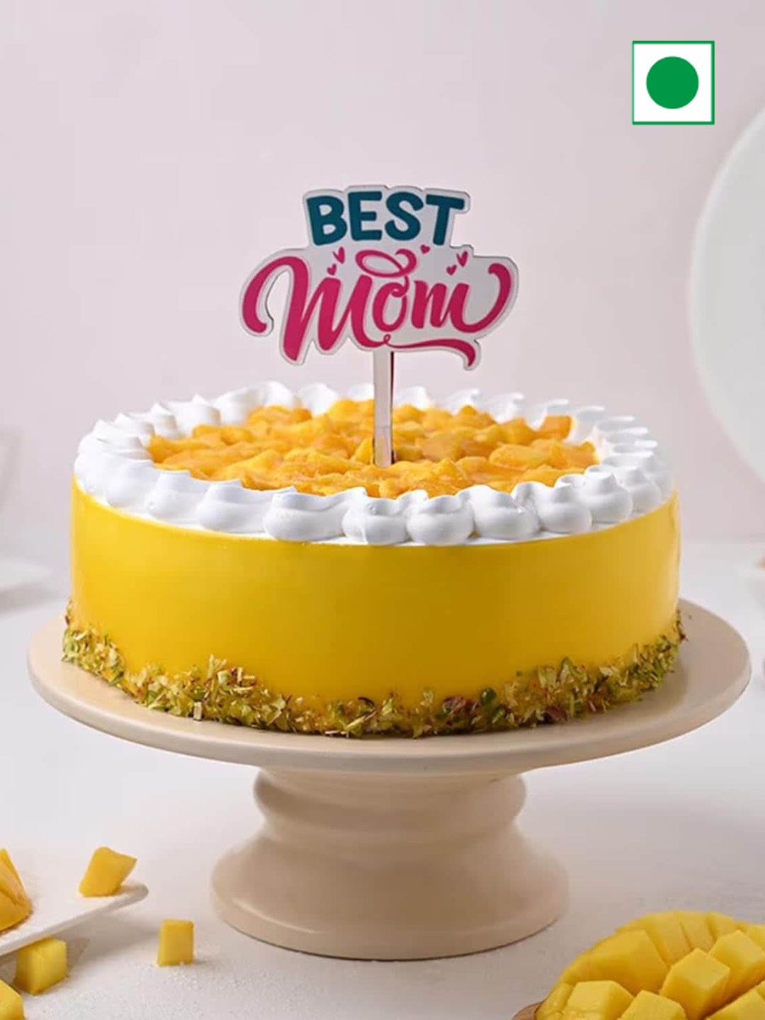 

Floweraura Mother's Day Round Eggless Mango Pistachio Flavour Cake -500 g, Yellow