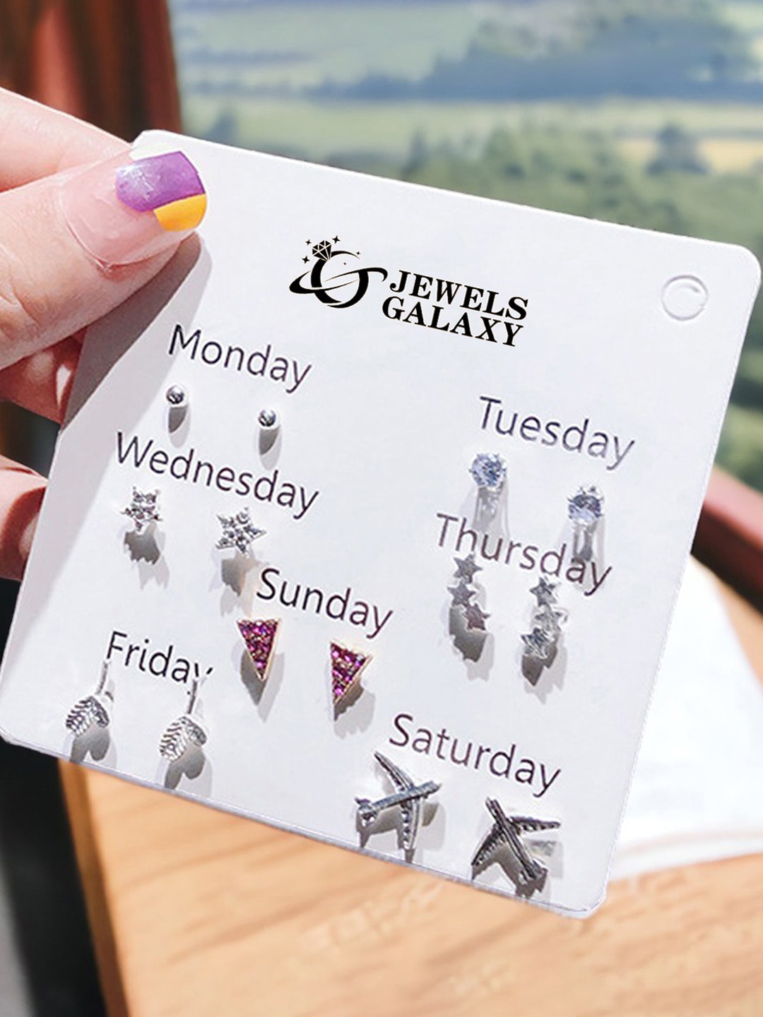 

Jewels Galaxy Set Of 7 Silver Plated Crystals Studded Contemporary Studs Earrings